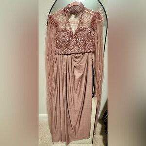Indian outfit: skirt with crop top and feather cape sleeves